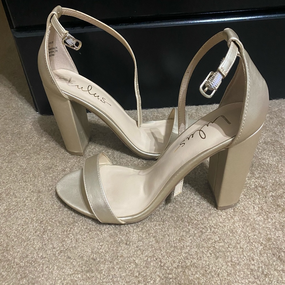 Lulu’s gold heels
